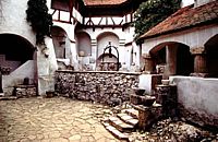 The capitol city of Carpathia is a labyrinth of streets and courtyards. This stately cobbled yard is surrounded by the homes of wealthy Carpathian merchants.